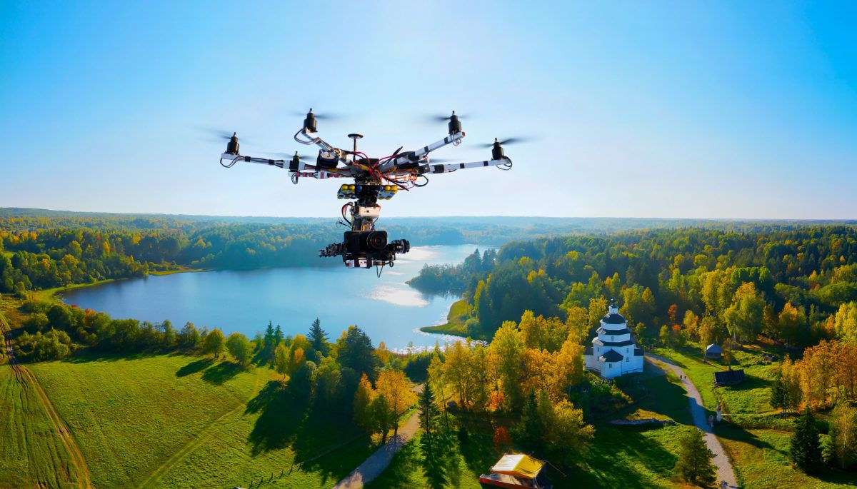 drone-photographing-lake-in-the-summer