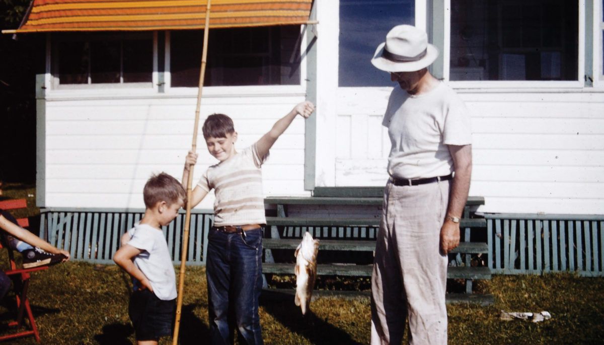 Boys-and-dad-with-caught-fish-1950s-bamboo-fishing-rod