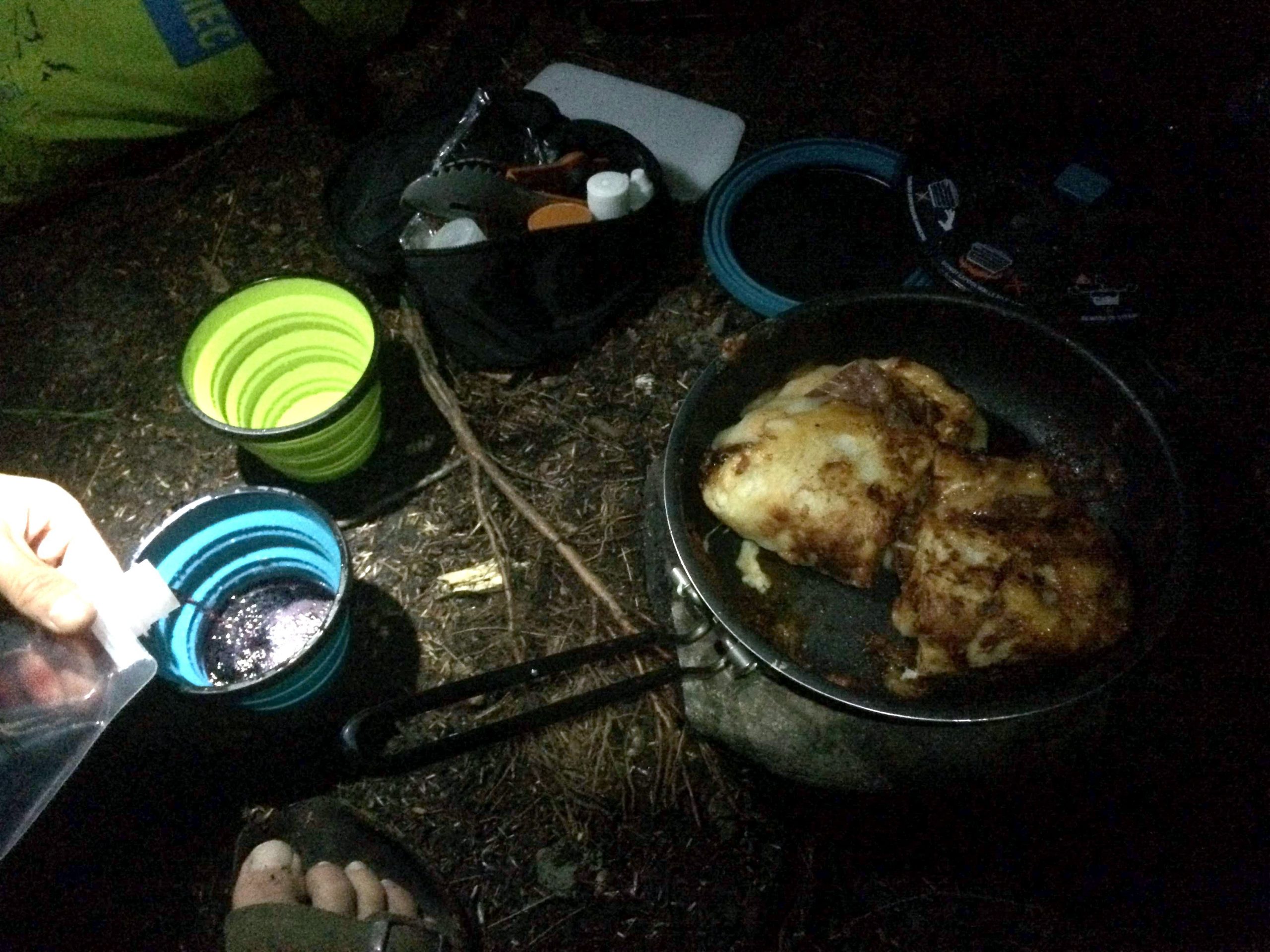 a campfire meal on a canoe trip