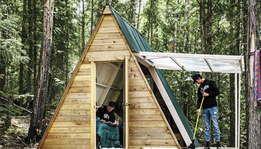 A-frame cabin with pop-up side