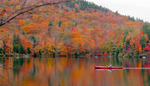 Beautiful fall landscape with lake and mountains