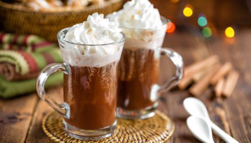 Hot frothy drinks in a festive scene