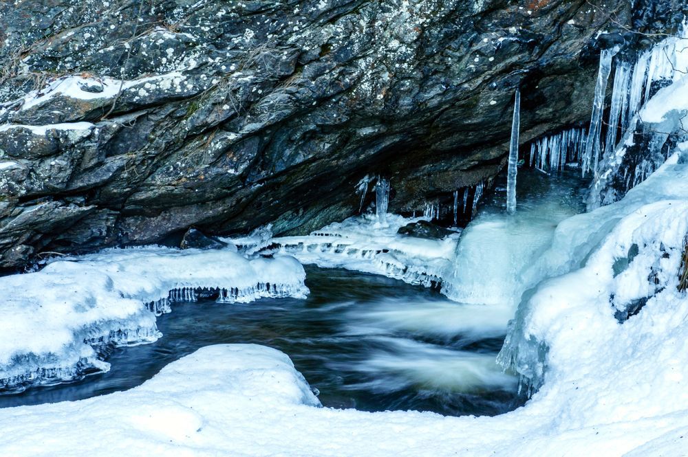 A mountain stream with ice
