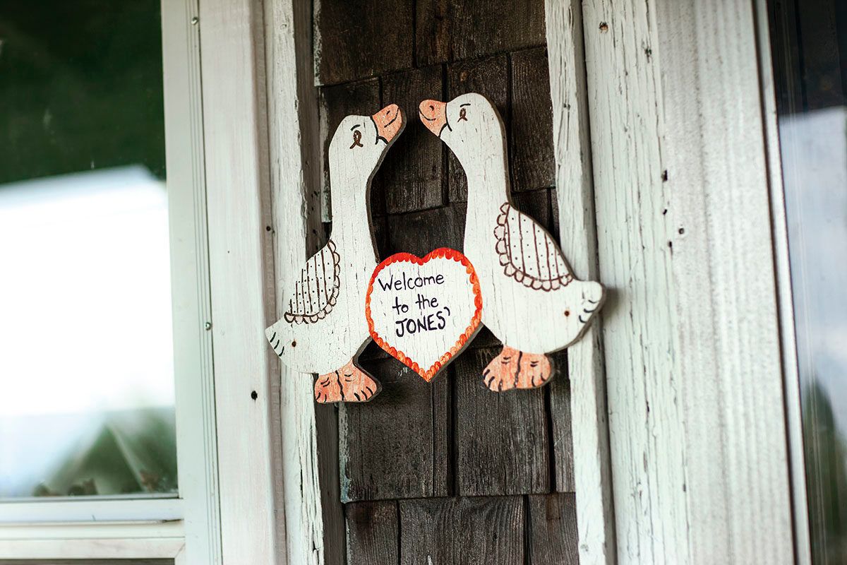 "Welcome to the Jones'" sign on a cottage door