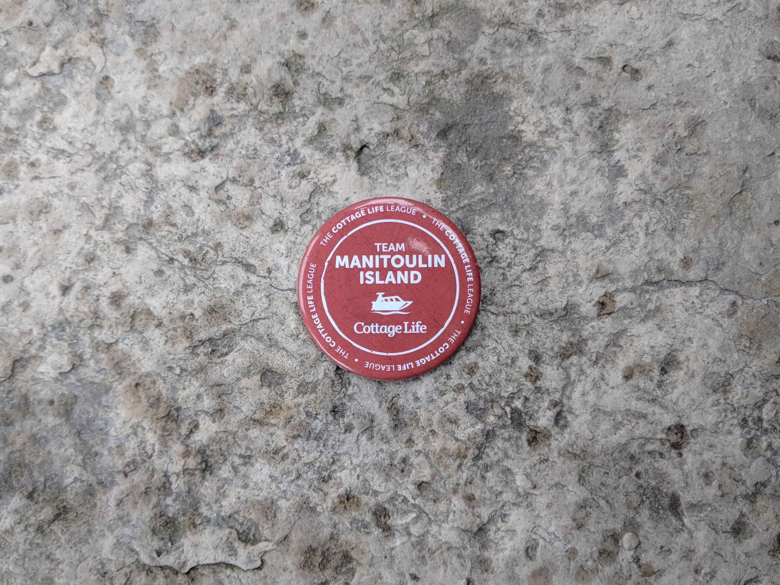 A button with the location Manitoulin Island