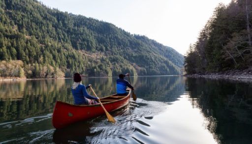 a-couple-canoeing-on-a-lake-in-british-columbia
