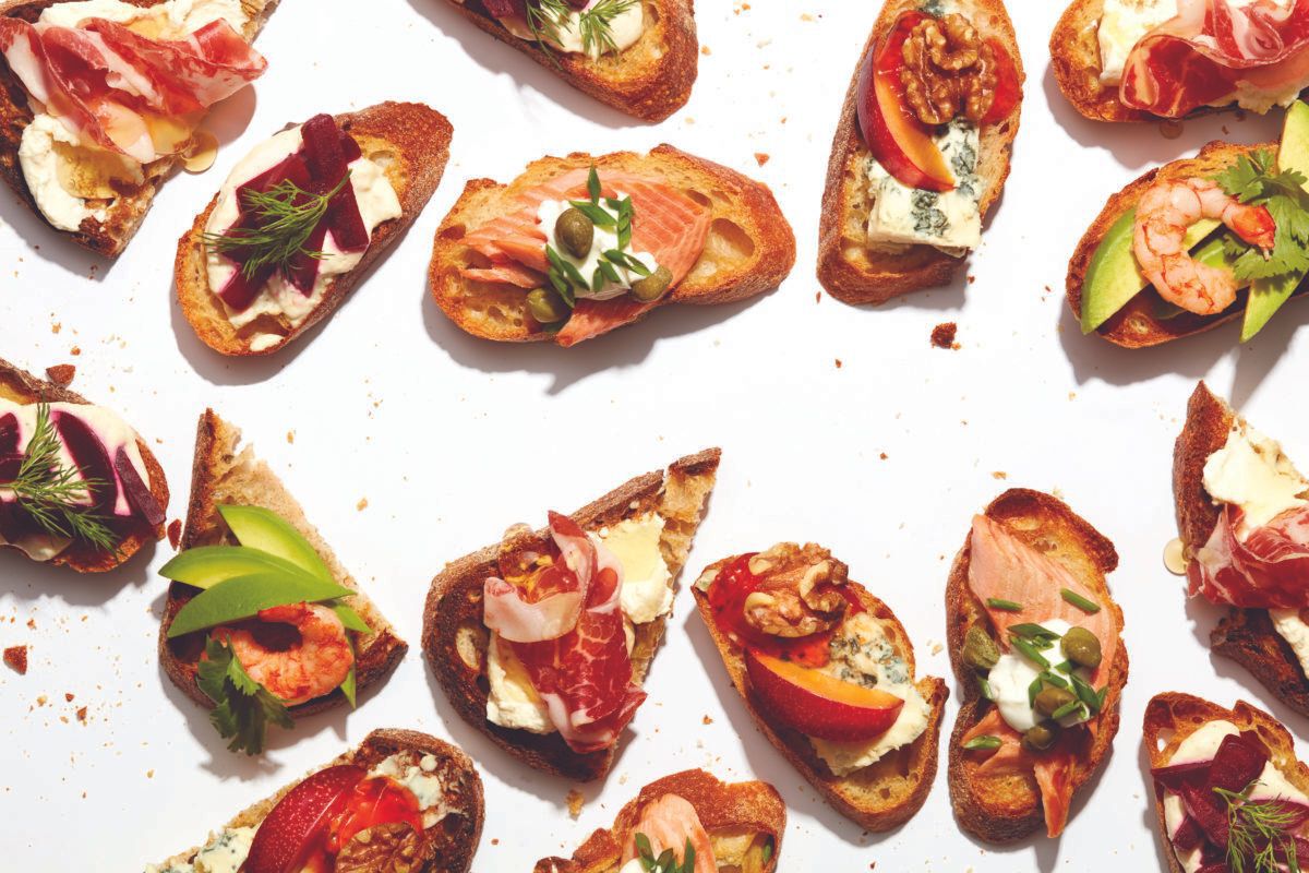 Crostini snacks. Toasts with different toppings