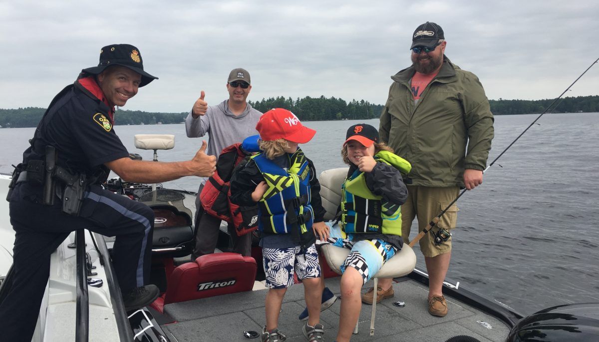 Cottagers after a successful boating courtesy check with OPP