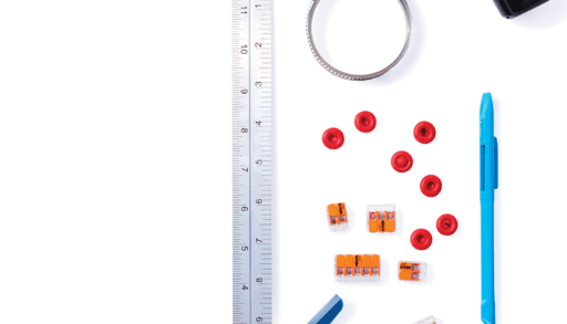 collection of workshop tools and accessories on a white background