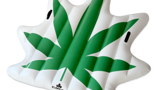 An inflatable pool float in the shape of a cannabis leaf