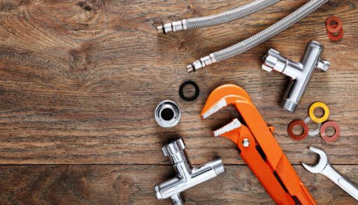 tools-on-wooden-background