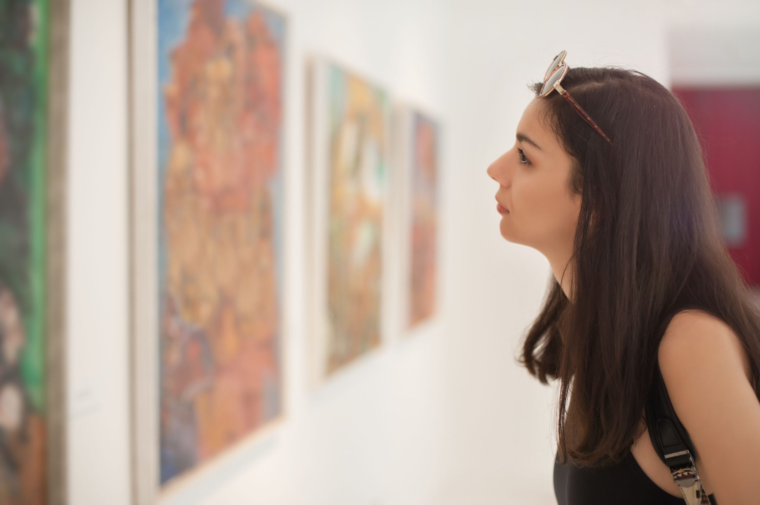 Woman looking at art in a gallery