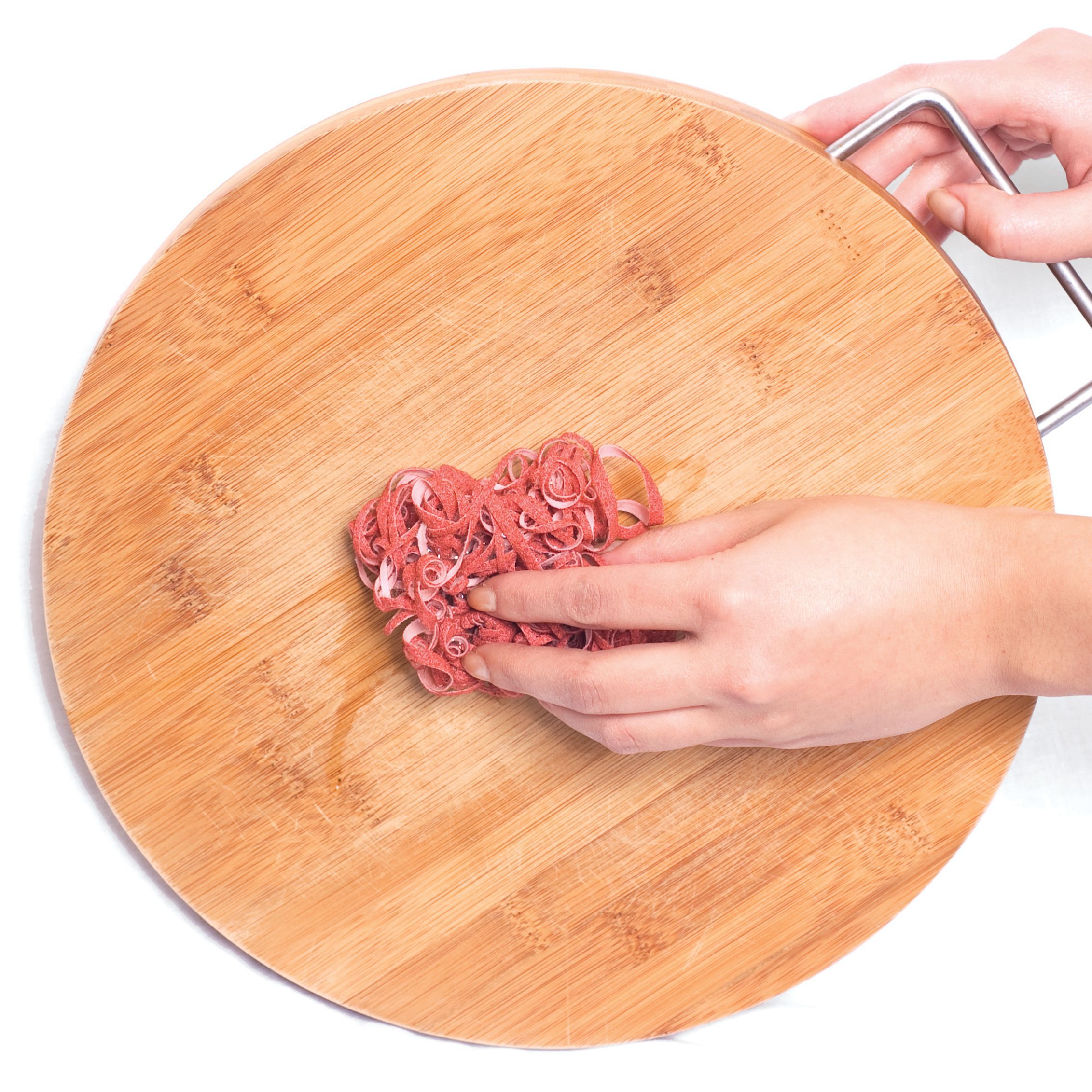 Spaghetti sponge made from peach pits