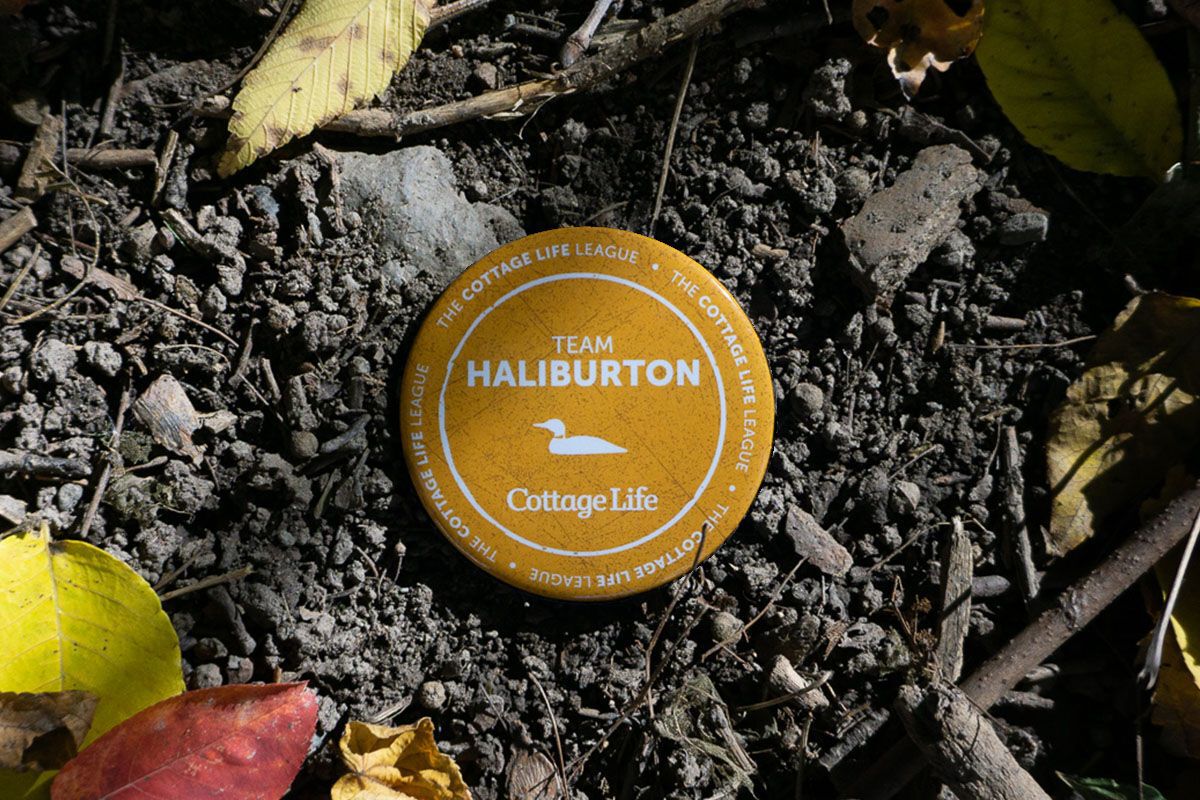 a button with Haliburton on it