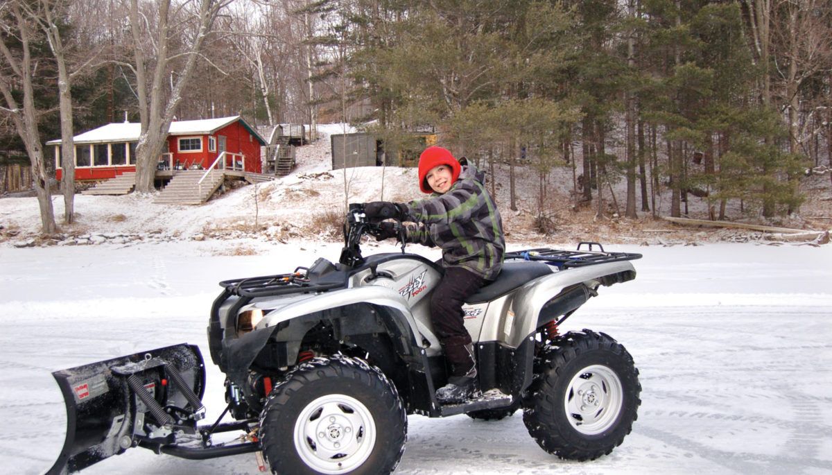 diy snow plow on atv with boy riding atv