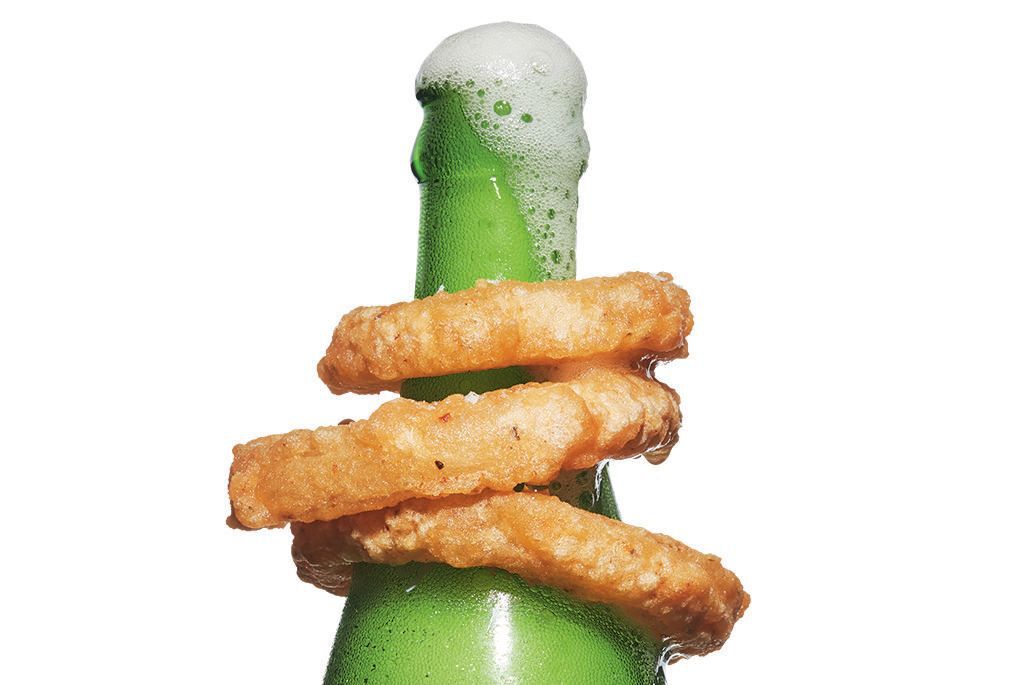 onion rings on the neck of a beer bottle
