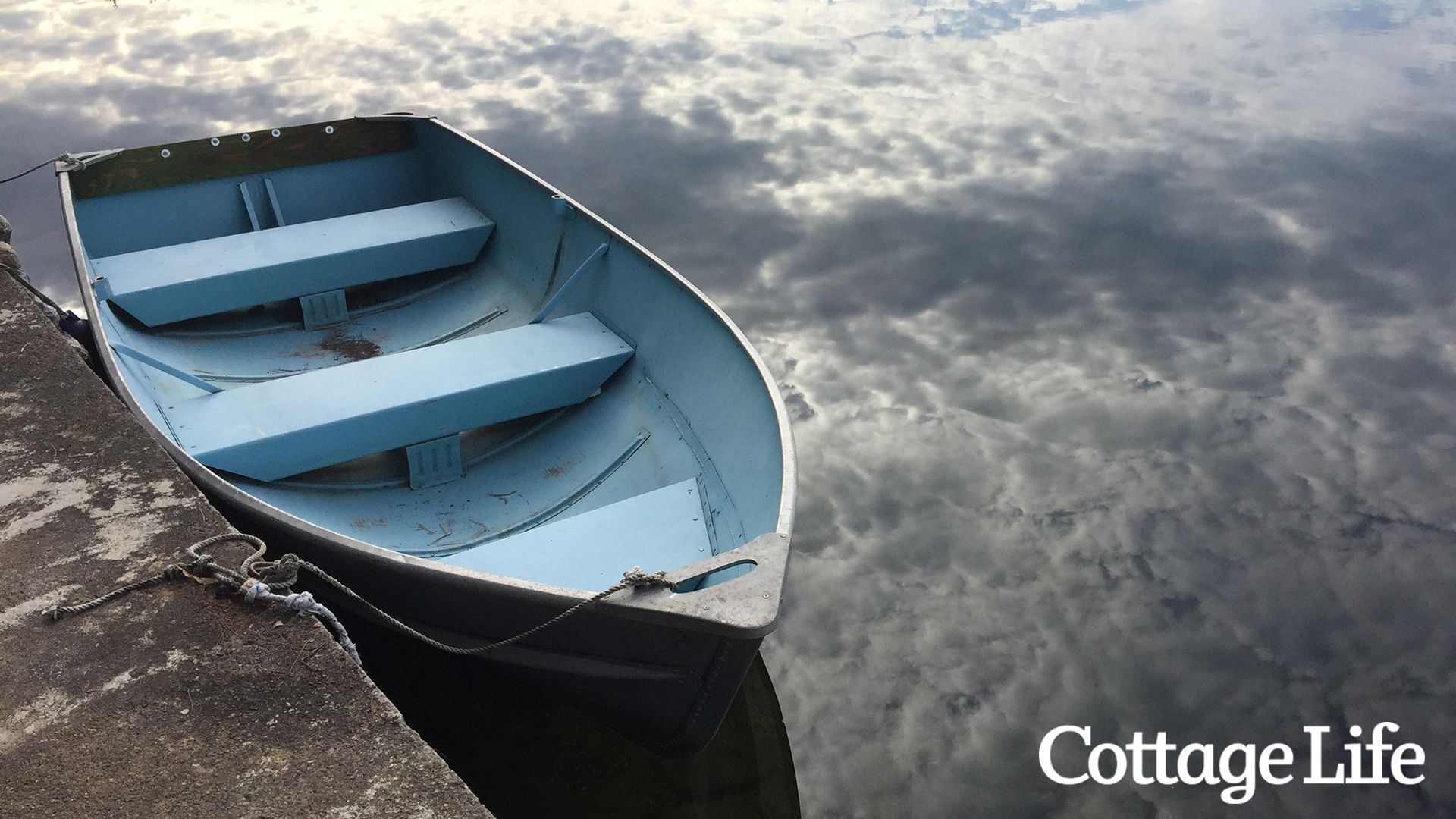 A tin boat floats in the water