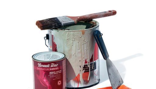 a paint can, rubber gloves, paintbrush, and scraper on a white background