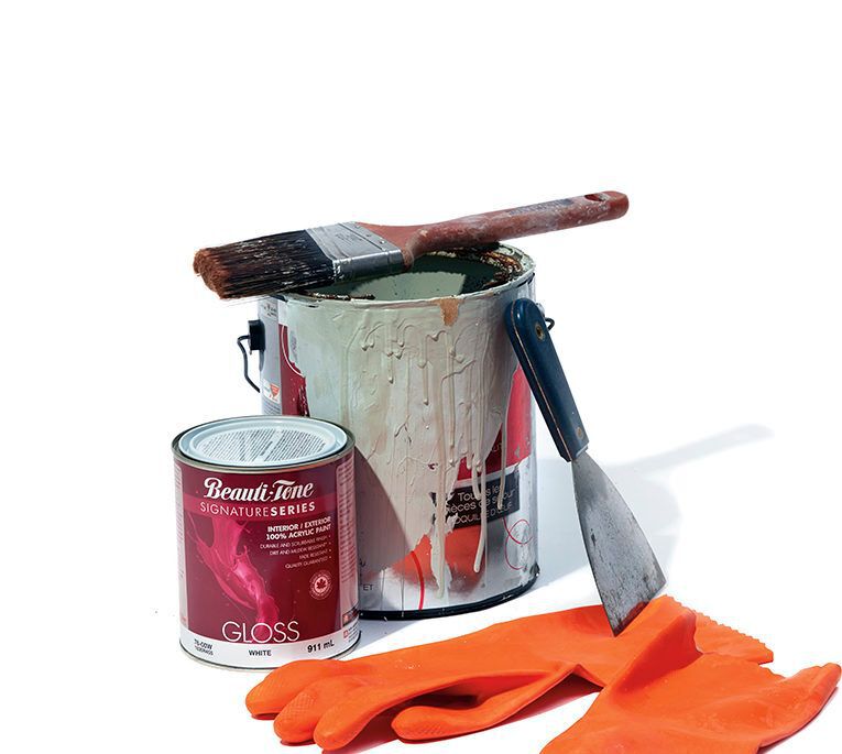 a paint can, rubber gloves, paintbrush, and scraper on a white background