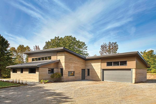 rammed earth house from the outside, sustainable
