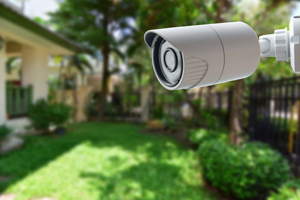 A security camera in a yard