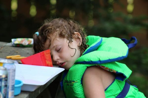 A child asleep at the table