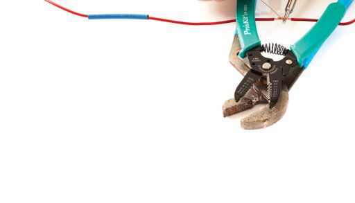 two hand soldering a wire on a white background, solder
