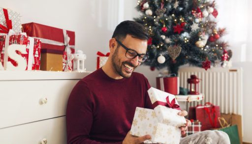 Man opening present
