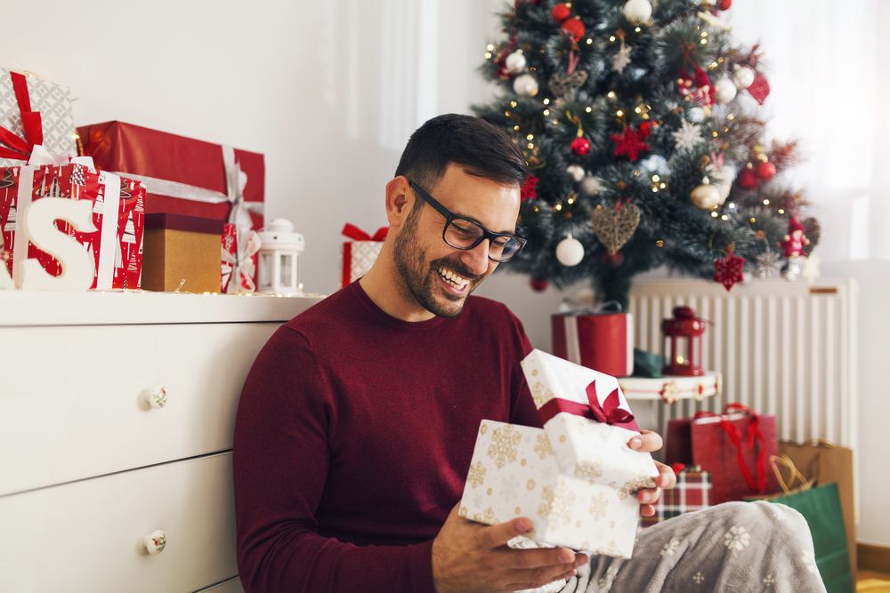Man opening present