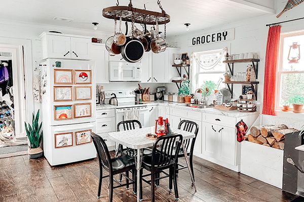 wider shot of the kitchen including the dining area, family