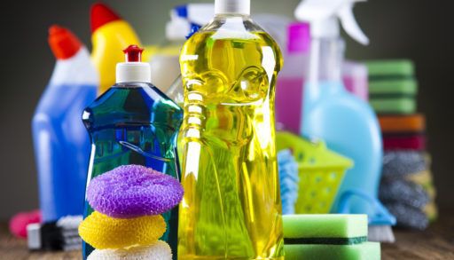 A close-up of several colourful cleaning products