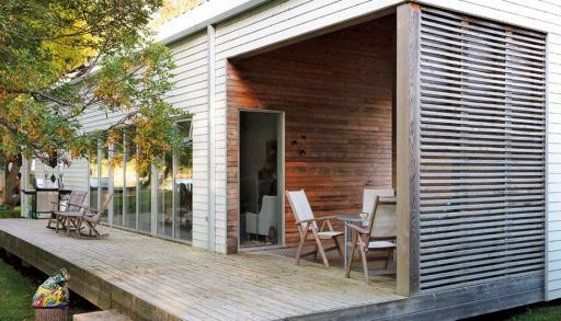 outside view looking on to the deck of the minimalist cottage