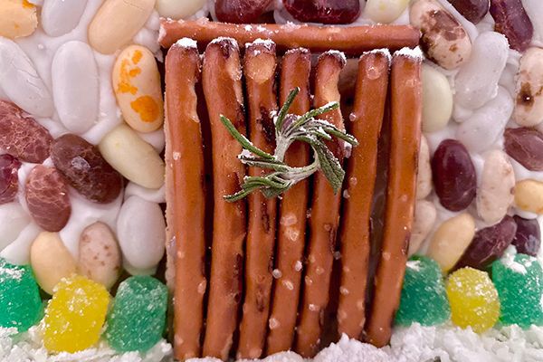 gingerbread cottage door made out of pretzel sticks