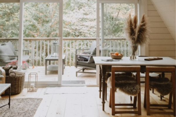 interior of aframe looking out to the deck