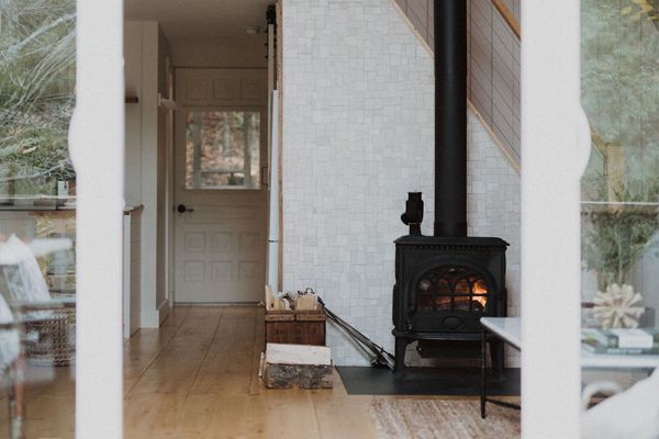 inside of aframe with wood-burning stove