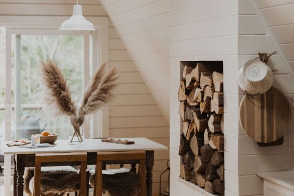 built in woodboox inside the aframe and dining room table