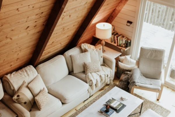 looking down from the top level of the aframe into the living room