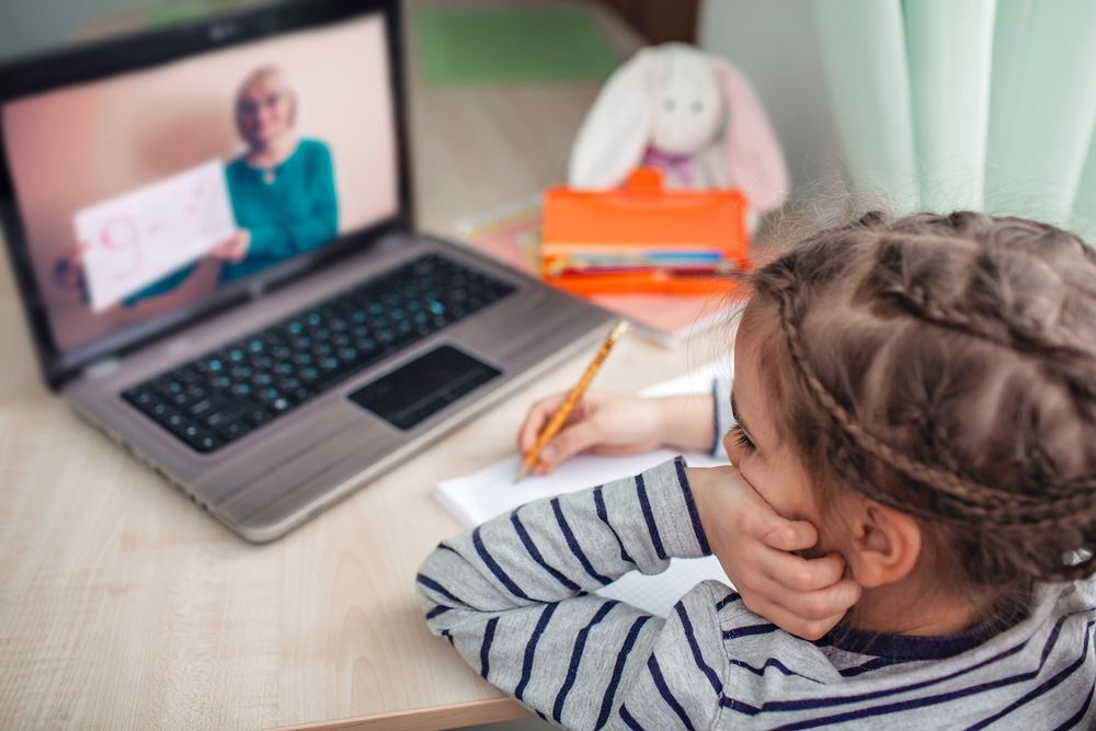school girl learning from a computer Google Classroom concept