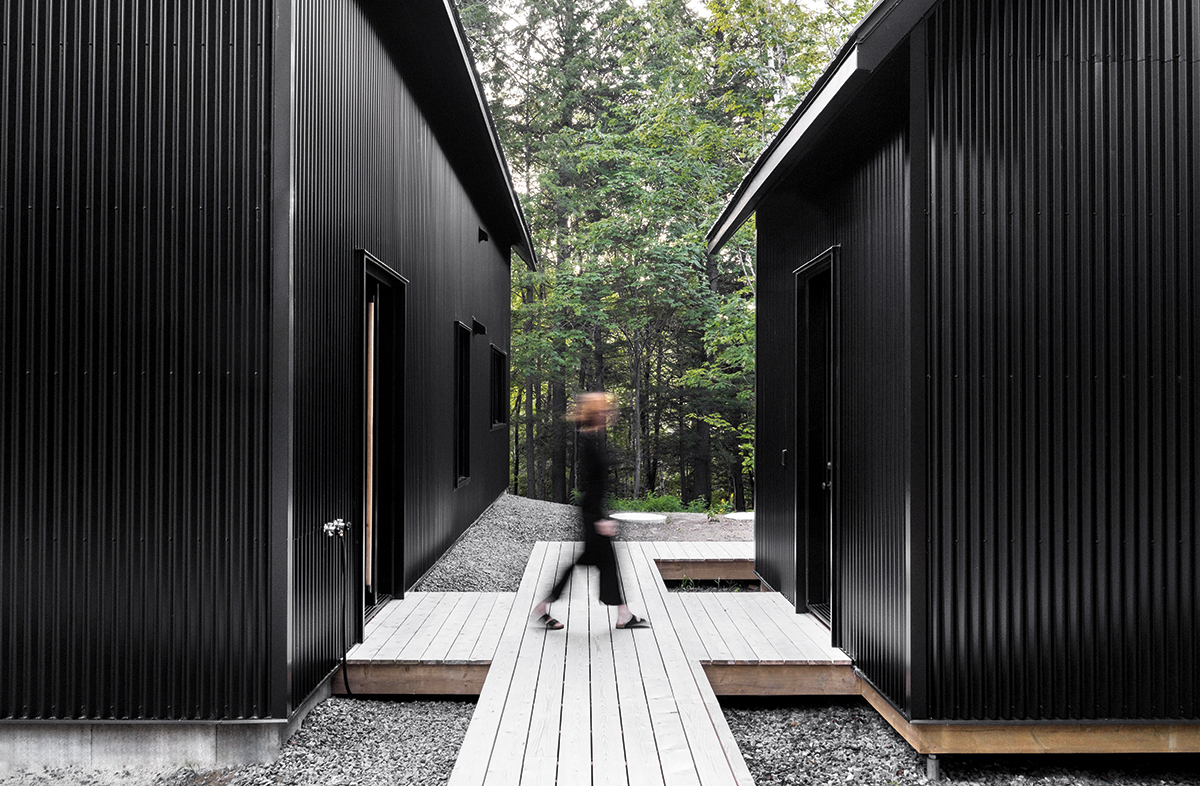 grand pic chalet two smaller cottages linked by a boardwalk in colin and justin's book escapology