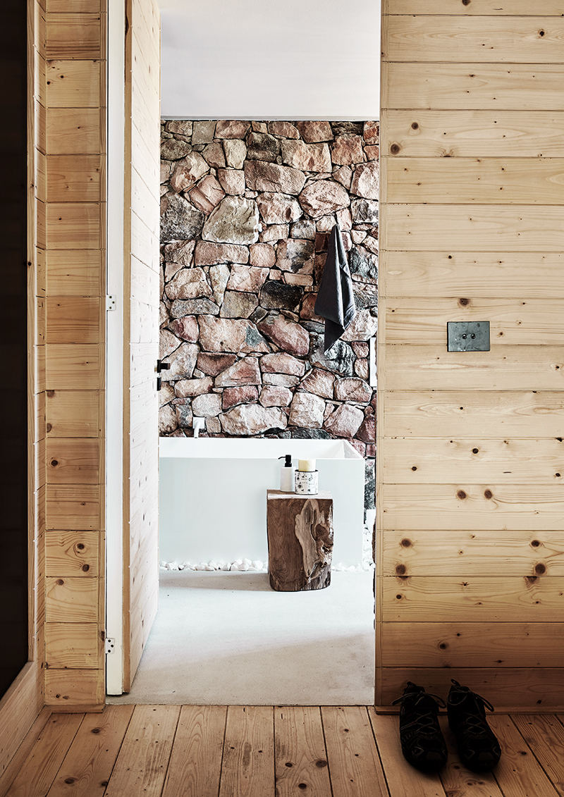 interior of wooden bathroom with stone detail, colin and justin's escapology