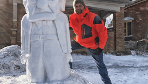 the snow sculptor Matt Morris with one of his impressive ice sculptors