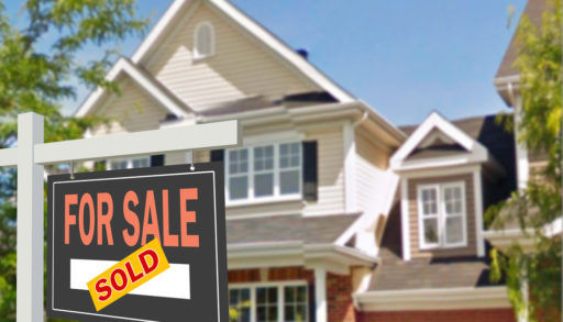 house or cottage for sale and sold sign