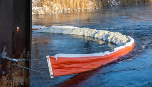 foam-in-Ontario-lake-water-stopped-by-floating-boom-to-prevent-pollution