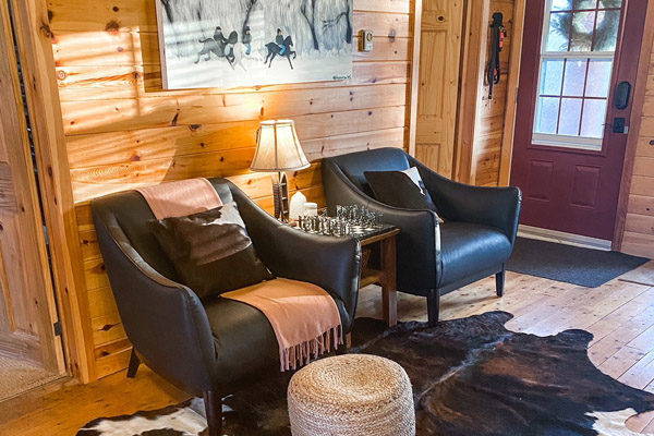 leather chairs in cottage at Crystal Lake
