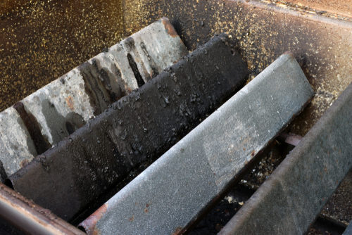 Inside of very dirty gas grill. barbecue tune-ups