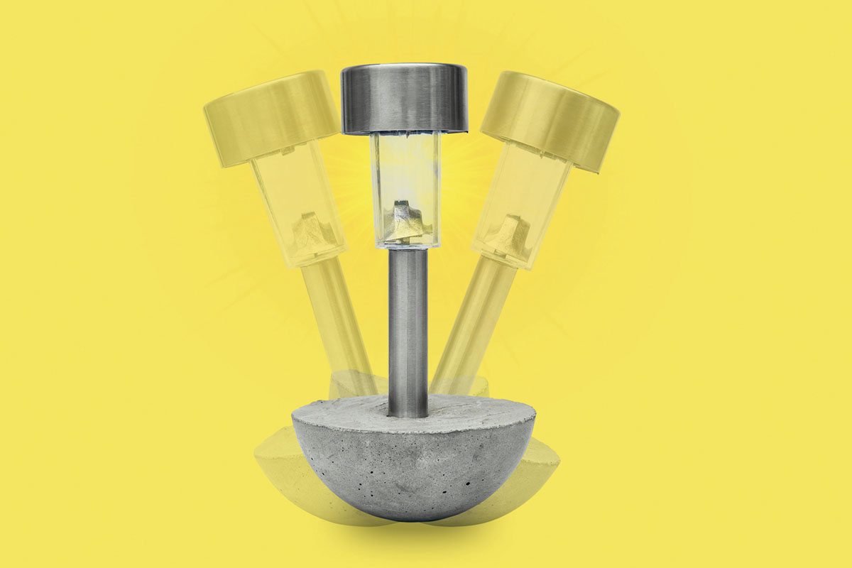 A solar stake light in a spherical cement mould.