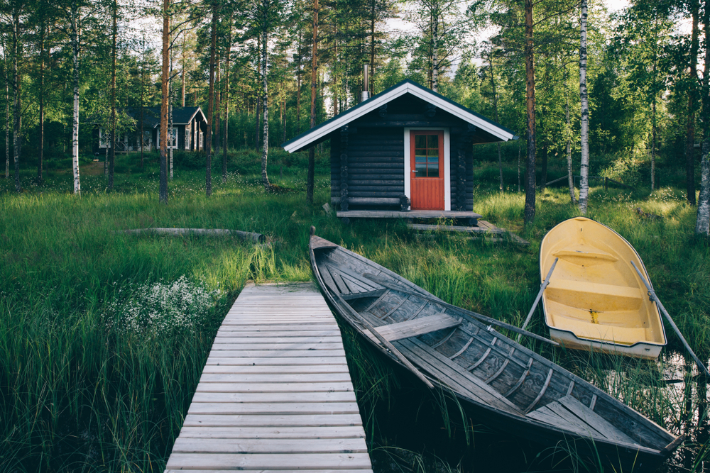 boat in front of cottage