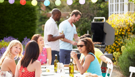 A group of people at a barbecue.