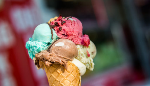 Waffle cone with four scoops of ice cream