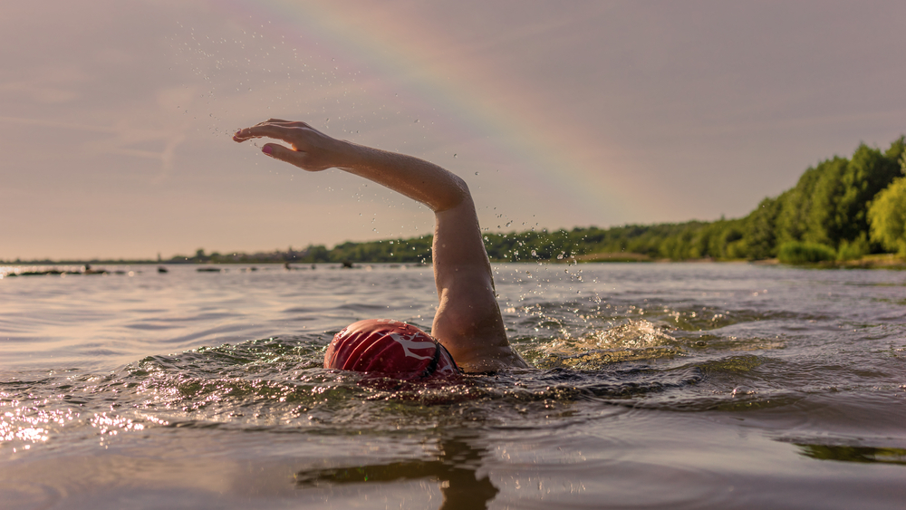A woman swimming in a lake